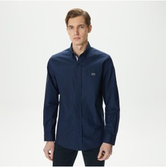 تصویر پیراهن مردانه لاکوست اورجینال آبی سرمه ای Lacoste TYC44358522AE36700 