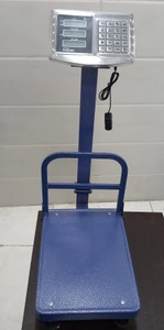 تصویر فروشگاه باسکول و ترازو توزین کار