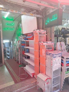 تصویر فروشگاه نردبان و قفسه شلف بان