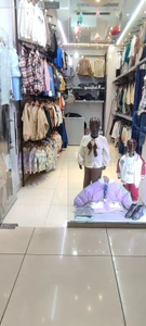 تصویر فروشگاه پوشاک بچگانه زوم کیدز